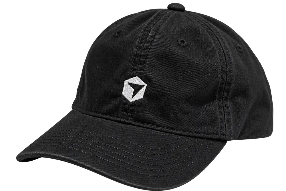 Black cap with a small white geometric Cursor logo embroidered on the front and a curved stitched brim