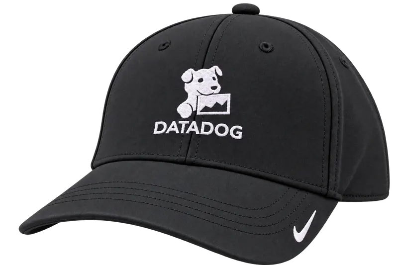 Black Datadog Nike Dri-FIT cap with a white mascot logo and a white Nike mark on the brim