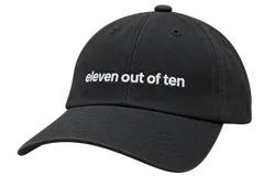 Black ElevenLabs cap with "eleven out of ten" embroidered in white across the front