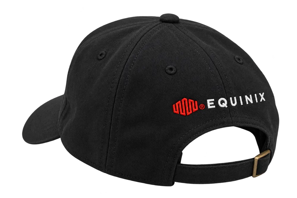 Back of the black Groq partner cap with red and white Equinix embroidery above an adjustable strap and metal buckle